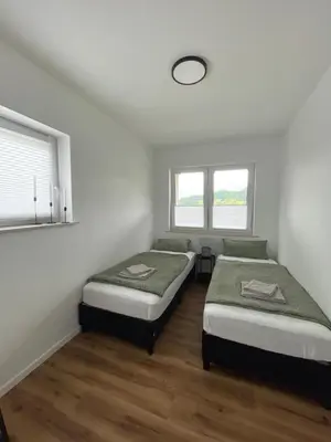 Ein Bett oder Betten in einem Zimmer der Unterkunft Ferienwohnung am Felsenmeer