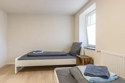 Ein Bett oder Betten in einem Zimmer der Unterkunft Haus zu mieten im schönen Sulzheim Wörrstadt