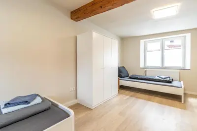 Ein Bett oder Betten in einem Zimmer der Unterkunft Haus zu mieten im schönen Sulzheim Wörrstadt