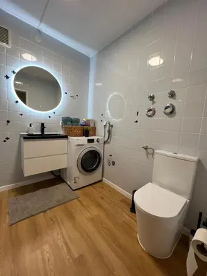 Ein Badezimmer in der Unterkunft Moderne, helle Terrassenwohnung im Kurort