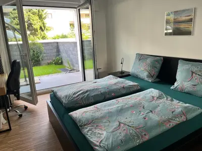 Ein Bett oder Betten in einem Zimmer der Unterkunft Ferienwohnung Hantmann