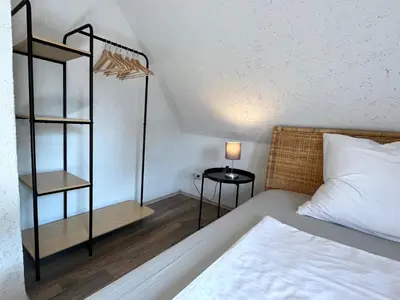 Ein Bett oder Betten in einem Zimmer der Unterkunft 90qm Ferienhaus Lorsch