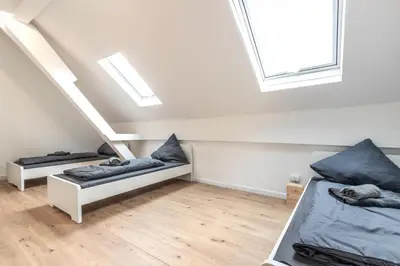 Ein Bett oder Betten in einem Zimmer der Unterkunft Zentral gelegene Unterkunft zB für Monteure in Sprendlingen 3 min vom Bahnhof entfernt