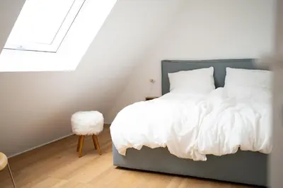 Ein Bett oder Betten in einem Zimmer der Unterkunft slot Ferienwohnung Schwetzingen