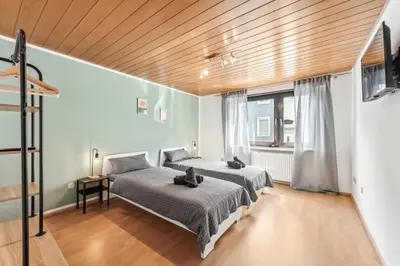 Ein Bett oder Betten in einem Zimmer der Unterkunft Amalfi A06 - für 6 PP - 3 Zi - 6 Betten - Terrasse inkl smart TV
