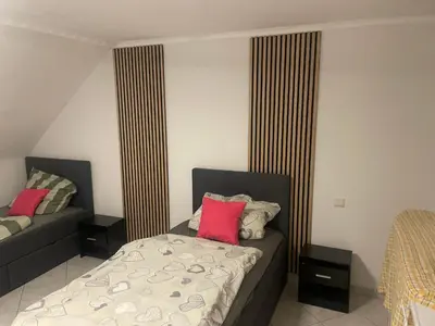 Ein Bett oder Betten in einem Zimmer der Unterkunft Top möblierte Unterkunft in Ludwigshafen