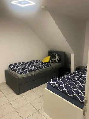 Ein Bett oder Betten in einem Zimmer der Unterkunft Top möblierte Unterkunft in Ludwigshafen