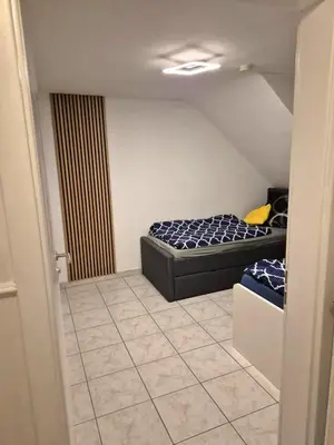 Ein Bett oder Betten in einem Zimmer der Unterkunft Top möblierte Unterkunft in Ludwigshafen