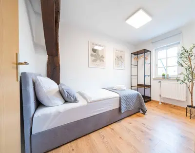 Ein Bett oder Betten in einem Zimmer der Unterkunft C&S Living I Wohnung I Balkon I Küche I Stellplatz