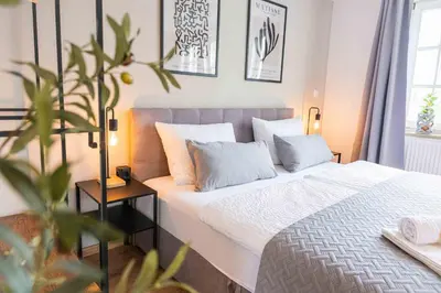 Ein Bett oder Betten in einem Zimmer der Unterkunft C&S Living I Wohnung I Balkon I Küche I Stellplatz