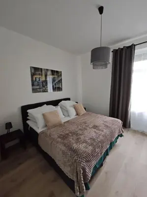 Ein Bett oder Betten in einem Zimmer der Unterkunft Pfalz Oase