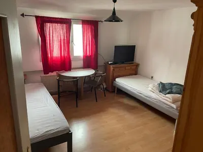 Ein Bett oder Betten in einem Zimmer der Unterkunft Monteurwohnung Holländer