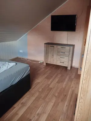 Ein Bett oder Betten in einem Zimmer der Unterkunft Ferienwohnung Zur Schönen Aussicht