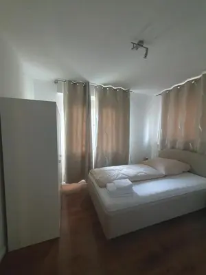 Ein Bett oder Betten in einem Zimmer der Unterkunft Gemütliche Ferienwohnung direkt an der Uniklinik Mainz