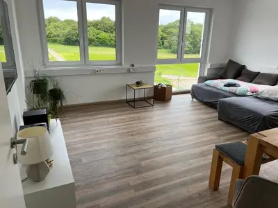 Ein Sitzbereich in der Unterkunft Boardinghouse Friolzheim