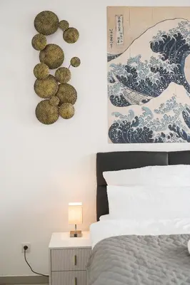 Ein Bett oder Betten in einem Zimmer der Unterkunft Lemon3 - privater Garten mit Grill, Mini-Gym, zentral in Karlsruhe