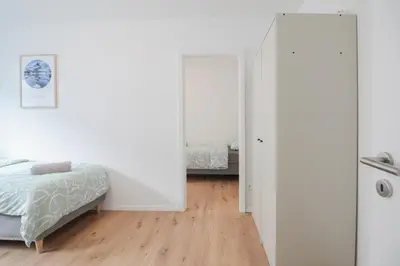 Ein Bett oder Betten in einem Zimmer der Unterkunft nJoy! Central & Pleasant Pforzheim - Balkon