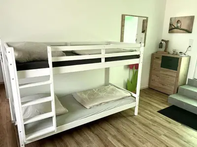 Ein Bett oder Betten in einem Zimmer der Unterkunft Moderne, stilvolle Ferienwohnung in Eich