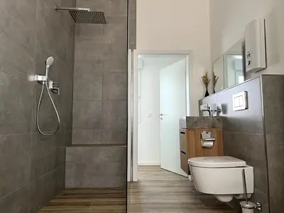 Ein Badezimmer in der Unterkunft Moderne, stilvolle Ferienwohnung in Eich