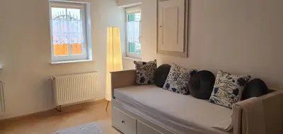 Ein Sitzbereich in der Unterkunft Gästehaus Ringhof