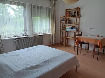 Ein Bett oder Betten in einem Zimmer der Unterkunft Unser Haus am Weinberg