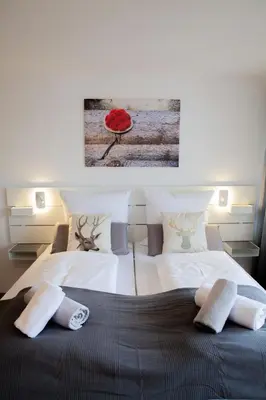 Ein Bett oder Betten in einem Zimmer der Unterkunft albview - zentral - modern - Nähe Kur- Rehaklinik - Albtherme
