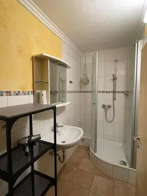 Ein Badezimmer in der Unterkunft 2 Zimmer FeWo Schwetzingen zwischen Mannheim und Heidelberg