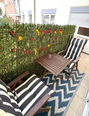 Ein Garten an der Unterkunft 2 Zimmer FeWo Schwetzingen zwischen Mannheim und Heidelberg