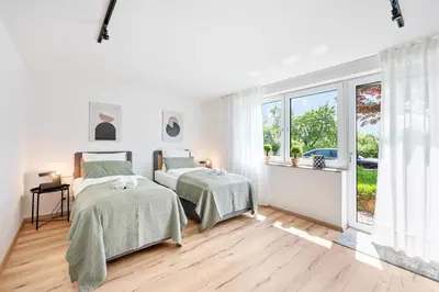 Ein Bett oder Betten in einem Zimmer der Unterkunft Neu mit Terrasse! 2BR 4Beds- schönste Aussicht - frisch saniert- barrierefreie! -Mozart ZWEI - Bietigheim