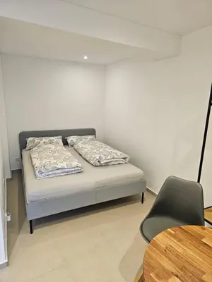 Ein Bett oder Betten in einem Zimmer der Unterkunft Edenkobener Retreat