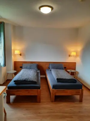 Ein Bett oder Betten in einem Zimmer der Unterkunft Monteurwohnung - Handwerkerwohnung Jesse Bad König