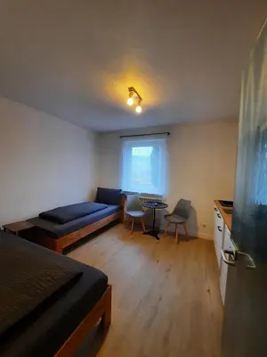Ein Sitzbereich in der Unterkunft Monteurwohnung - Handwerkerwohnung Jesse Bad König