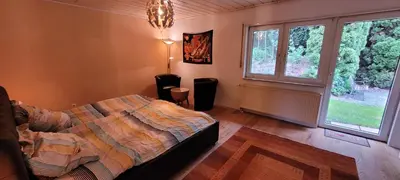 Ein Bett oder Betten in einem Zimmer der Unterkunft FeWo in Heddesbach