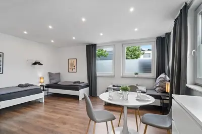 Ein Bett oder Betten in einem Zimmer der Unterkunft RO01 Schickes 1-Zimmer Apartment
