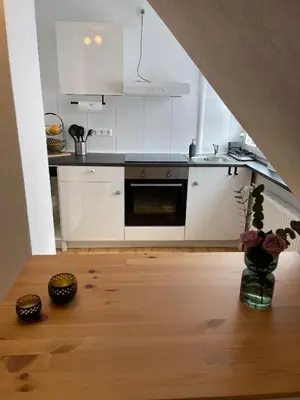 Küche/Küchenzeile in der Unterkunft Ferienwohnung am Kelterplatz