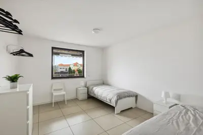 Ein Bett oder Betten in einem Zimmer der Unterkunft MONTEUR - Unterkunft für bis zu 7 Personen in 64569 Nauheim - GG09
