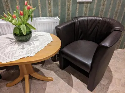 Ein Sitzbereich in der Unterkunft Altes Häusle - Doppelzimmer Weinrebe