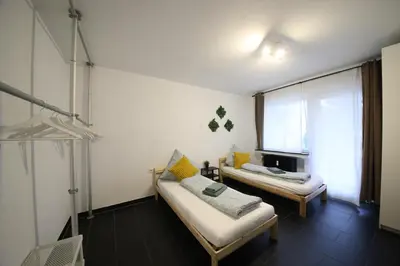 Ein Bett oder Betten in einem Zimmer der Unterkunft NEW Luxury Apartment in Heilbronn Neckarsulm