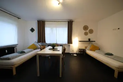 Ein Bett oder Betten in einem Zimmer der Unterkunft NEW Luxury Apartment in Heilbronn Neckarsulm