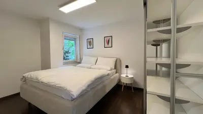 Ein Bett oder Betten in einem Zimmer der Unterkunft LudwigsHome - Zentral, 120qm, Kostenloser Parkplatz, Terrasse, SmartTV