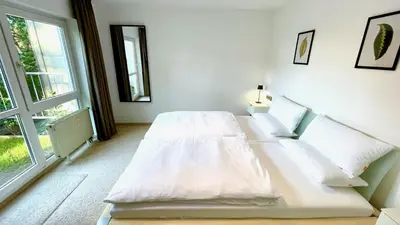Ein Bett oder Betten in einem Zimmer der Unterkunft LudwigsHome - Zentral, 120qm, Kostenloser Parkplatz, Terrasse, SmartTV