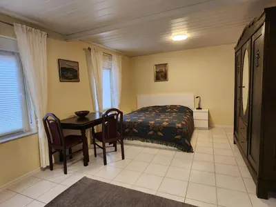 Ein Bett oder Betten in einem Zimmer der Unterkunft Schönes Studio mit Küche, frisch renoviert