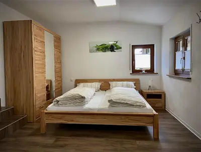 Ein Bett oder Betten in einem Zimmer der Unterkunft Haus Edith