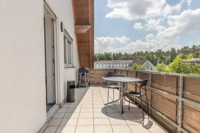 Ein Balkon oder eine Terrasse in der Unterkunft Monteurapartment I 8 Betten I Küche I Waschmaschine I Balkon