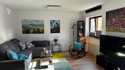 Ein Sitzbereich in der Unterkunft Ferienwohnung Weltachs
