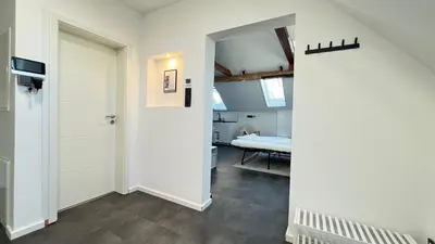 Ein Bett oder Betten in einem Zimmer der Unterkunft LudwigsHome - Zentrale Lage, Luxusbad, Workspace, Klima