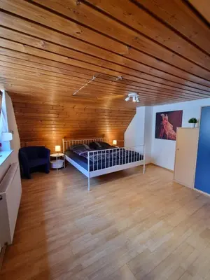 Ein Bett oder Betten in einem Zimmer der Unterkunft Ferienwohnung Heppenheim an der Bergstraße WHG 5
