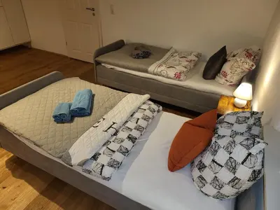 Ein Bett oder Betten in einem Zimmer der Unterkunft Pension Kostera 1 OG