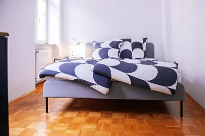 Ein Bett oder Betten in einem Zimmer der Unterkunft Moderne Loft-Wohnung im Herzen von Karlsruhe 68m2 1 OG