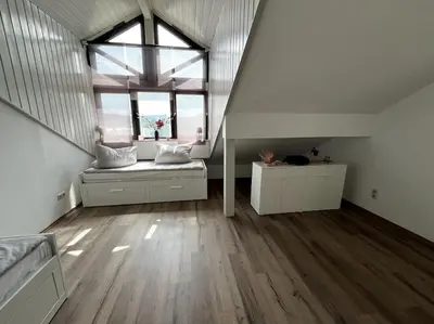 Ein Bett oder Betten in einem Zimmer der Unterkunft Moderne Wohnung mit Dachterrasse